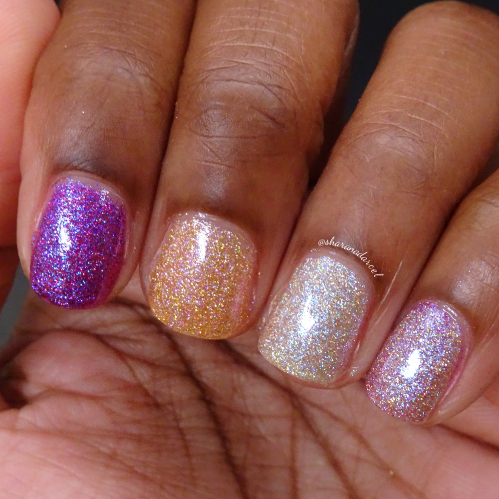 Zoya Celestia, Polaris, and Eradani nail polishes worn on short nails against dark skin